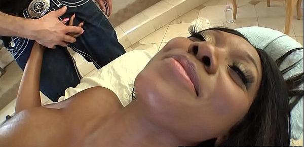  Hot black babe gets massaged and a little more